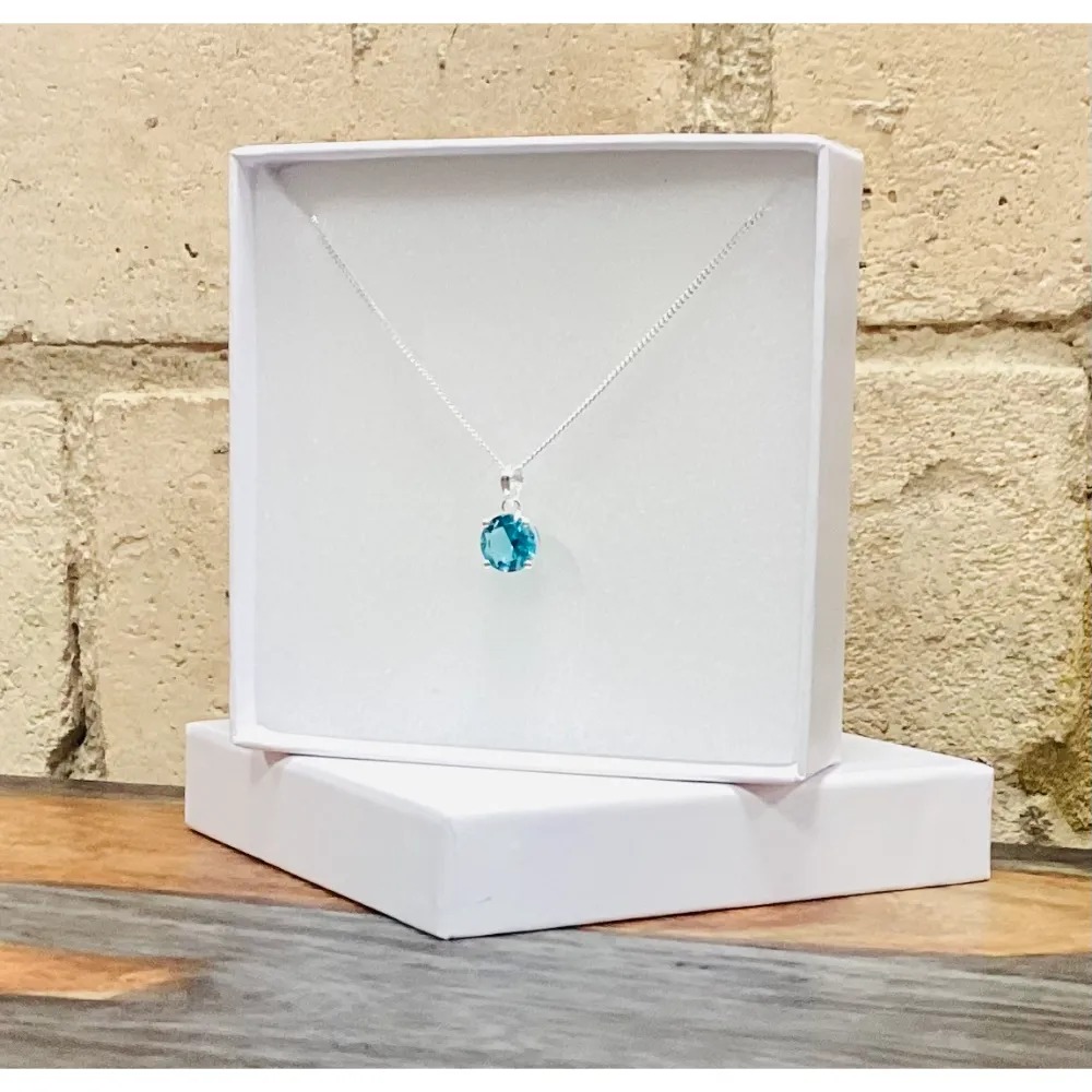 blue topaz pendant tiny round